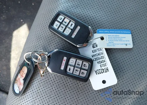 2018 Honda Odyssey Elite z USA, uszkodzony, nr VIN 5FNRL6H91JB070355